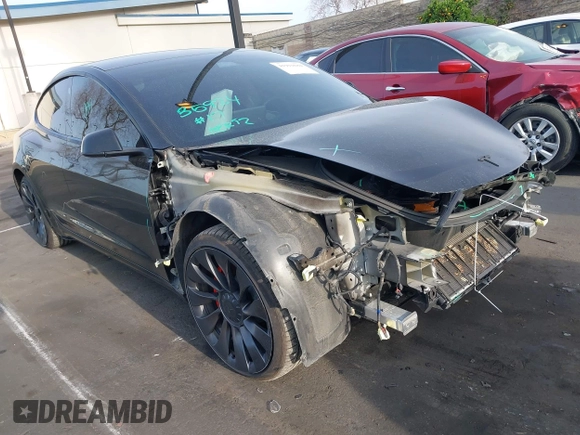 2023 Tesla Model 3 Performance z VIN 5YJ3E1EC3PF716085, wystawiony jako IAAI lot #41911684 z przebiegiem 45 184 mil mil oraz . Historia ofert i sprzedaży dostępna na DreamBid. Obrazek 1.