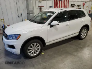 2012 Volkswagen Touareg Exec with VIN WVGEF9BP4CD011823, listed as a Copart auction lot 84063034 with 110,694 mi miles and Non Repairable. Bid and sale history available at DreamBid. Image 1.