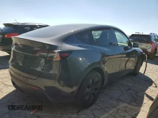 2024 Tesla Model Y Long Range z VIN 7SAYGDEE3RA323029, wystawiony jako Copart lot #50171805 z przebiegiem Nie podano mil oraz Szkoda całkowita • Salvage title. Historia ofert i sprzedaży dostępna na DreamBid. Obrazek 3.