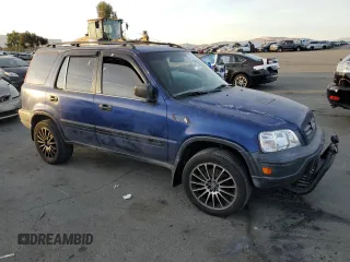 1999 Honda CR-V LX with VIN JHLRD1742XC066975, listed as a Copart auction lot 79447754 with 214,729 mi miles and Salvage Title. Bid and sale history available at carsss.com. Image 4.
