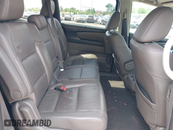 2012 Honda Odyssey EX-L with VIN 5FNRL5H67CB139701, listed as a IAAI auction lot 42233283 with 147,143 mi miles and . Bid and sale history available at DreamBid. Image 8.