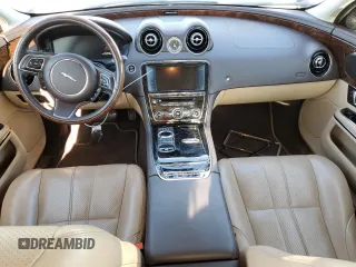 2014 Jaguar XJ with VIN SAJWA1CZ3E8V69877, listed as a Copart auction lot 48159005 with 57,567 mi miles and Clean Title. Bid and sale history available at DreamBid. Image 8.