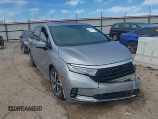 2021 Honda Odyssey Touring with VIN 5FNRL6H8XMB034837, listed as a IAAI auction lot 41856444 with 84,950 mi miles. Bid and sale history available at carsss.com. Image 1.