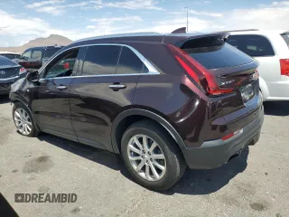 2020 Cadillac XT4 FWD Luxury z VIN 1GYAZAR40LF059910, wystawiony jako Copart lot #55426065 z przebiegiem 36 590 mil mil oraz Szkody całkowita. Historia ofert i sprzedaży dostępna na DreamBid. Obrazek 2.