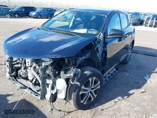 2018 Toyota RAV4 LE with VIN JTMBFREV1JJ743018, listed as a IAAI auction lot 41974309 with 59,135 mi miles. Bid and sale history available at carsss.com. Image 18.