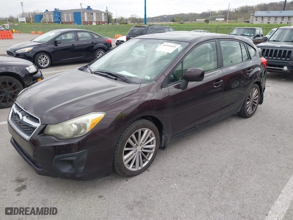 2012 Subaru Impreza Wagon 2.0i Premium with VIN JF1GPAD62CH206785, listed as a IAAI auction lot 41931021 with 126,127 mi miles. Bid and sale history available at carsss.com. Image 2.
