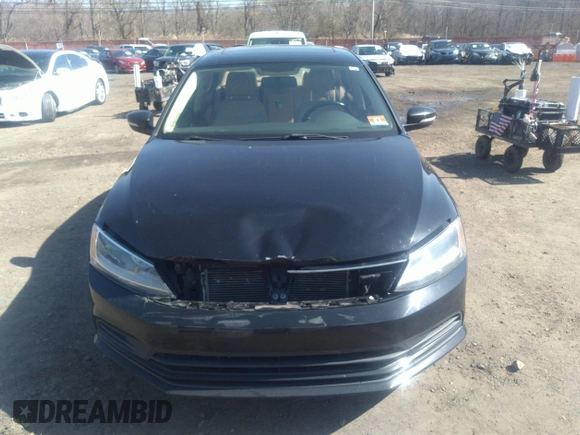 2016 Volkswagen Jetta Sedan 1.4T SE with VIN 3VWD67AJXGM242539, listed as a IAAI auction lot 38948493 with 121,876 mi miles. Bid and sale history available at carsss.com. Image 12.