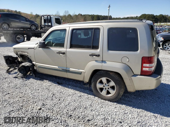 2010 Jeep Liberty Sport with VIN 1J4PP2GK9AW128825, listed as a Copart auction lot 48113835 with 258,730 mi miles and Salvage Title. Bid and sale history available at DreamBid. Image 2.