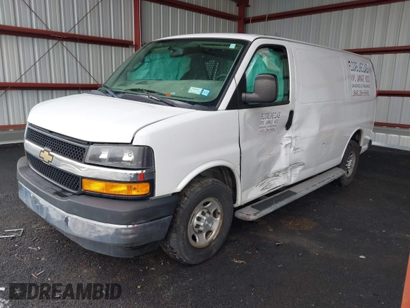 2018 Chevrolet Express Cargo Van with VIN 1GCWGAFG8J1905193, listed as a IAAI auction lot 41726804 with 83,690 mi miles. Bid and sale history available at carsss.com. Image 2.