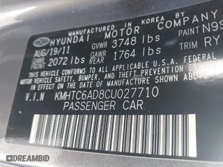 2012 Hyundai Veloster w/Gray Int with VIN KMHTC6AD8CU027710, listed as a IAAI auction lot 41758972 with 126,490 mi miles. Bid and sale history available at carsss.com. Image 9.