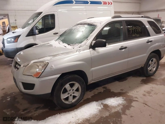 2009 Kia Sportage LX with VIN KNDJE723097571708, listed as a IAAI auction lot 41494118 with 140,869 mi miles. Bid and sale history available at carsss.com. Image 2.
