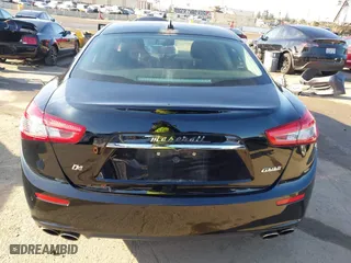 2014 Maserati Ghibli S Q4 with VIN ZAM57RTA2E1086046, listed as a IAAI auction lot 41846389 with 55,984 mi miles. Bid and sale history available at carsss.com. Image 16.