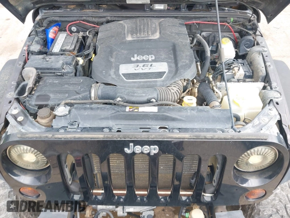 2013 Jeep Wrangler Unlimited Rubicon with VIN 1C4BJWFG5DL652050, listed as a IAAI auction lot 42451954 with 107,110 mi miles and . Bid and sale history available at DreamBid. Image 10.