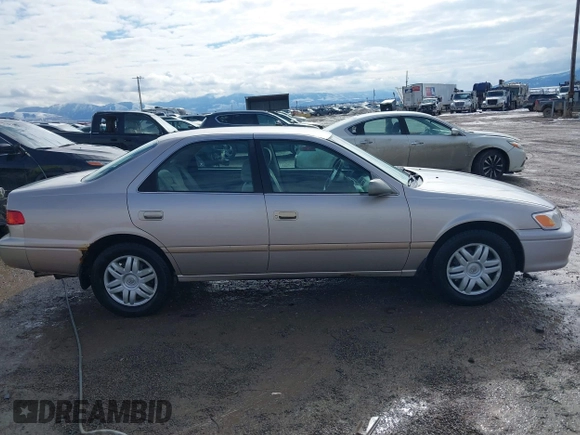 2001 Toyota Camry CE with VIN 4T1BG22K51U860223, listed as a IAAI auction lot 41650629 with 219,328 mi miles. Bid and sale history available at carsss.com. Image 13.