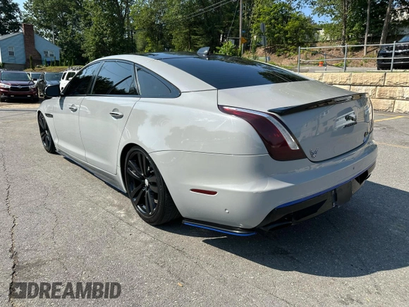 2016 Jaguar XJ Portfolio with VIN SAJWA2G7XG8V99511, listed as a Copart auction lot 63823895 with 102,082 mi miles and Clean title. Bid and sale history available at DreamBid. Image 2.