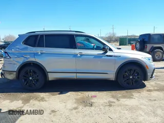 2022 Volkswagen Tiguan SE R-Line Black z VIN 3VVCB7AX4NM008121, wystawiony jako IAAI lot #41671382 z przebiegiem 71 674 mil mil oraz . Historia ofert i sprzedaży dostępna na DreamBid. Obrazek 13.