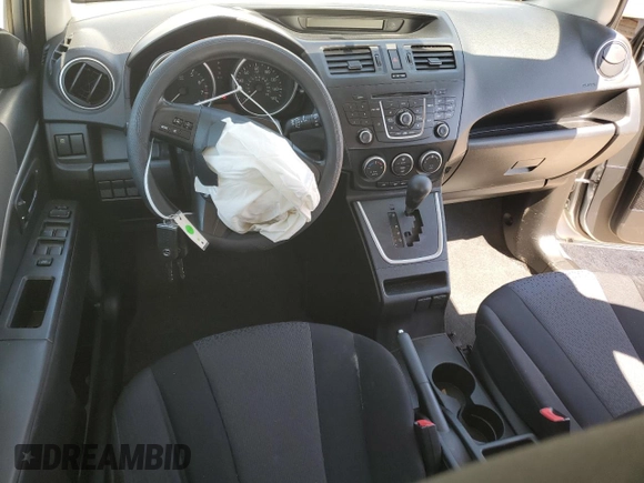 2012 Mazda 5 Sport with VIN JM1CW2BL3C0105912, listed as a Copart auction lot 50938335 with 117,479 mi miles and Salvage Title. Bid and sale history available at DreamBid. Image 8.