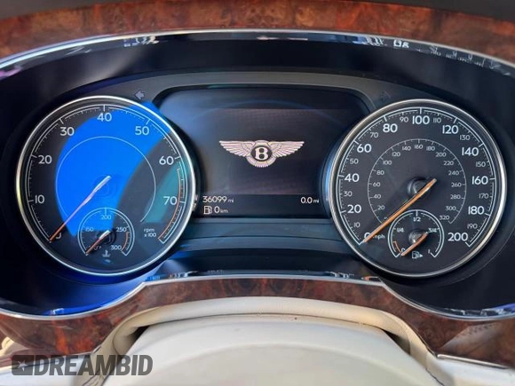 2017 Bentley Bentayga W12 z VIN SJAAC2ZV1HC014037, wystawiony jako Copart lot #54799655 z przebiegiem 36 099 mil mil oraz Szkody całkowita. Historia ofert i sprzedaży dostępna na DreamBid. Obrazek 9.