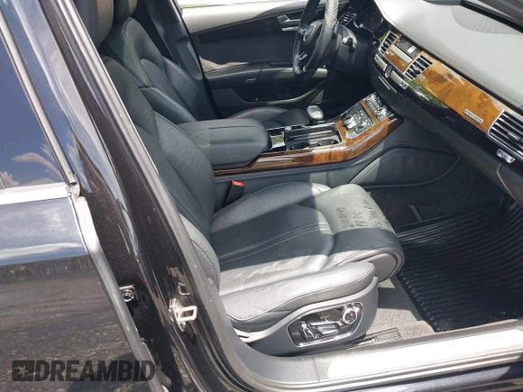 2015 Audi A8 3.0T with VIN WAU3GAFD6FN008993, listed as a IAAI auction lot 42239421 with 125,587 mi miles and . Bid and sale history available at DreamBid. Image 5.