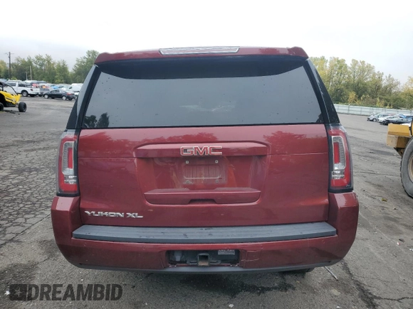 2019 GMC Yukon XL SLT with VIN 1GKS2GKC6KR341781, listed as a Copart auction lot 77468734 with 93,482 mi miles and Salvage Title. Bid and sale history available at DreamBid. Image 6.