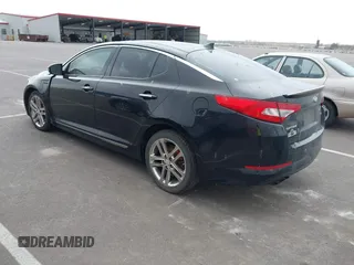 2013 Kia Optima SX with VIN 5XXGR4A63DG141938, listed as a IAAI auction lot 41760964 with 77,241 mi miles and . Bid and sale history available at DreamBid. Image 3.
