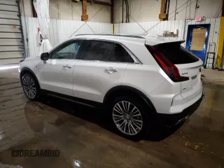 2024 Cadillac XT4 AWD Premium Luxury z VIN 1GYFZDR49RF100387, wystawiony jako Copart lot #76304794 z przebiegiem 14 649 mil mil oraz Szkoda całkowita • Salvage title. Historia ofert i sprzedaży dostępna na DreamBid. Obrazek 2.
