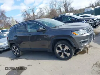 2017 Jeep Compass Latitude with VIN 3C4NJCBB4HT632758, listed as a IAAI auction lot 41849009 with 58,246 mi miles and . Bid and sale history available at DreamBid. Image 14.