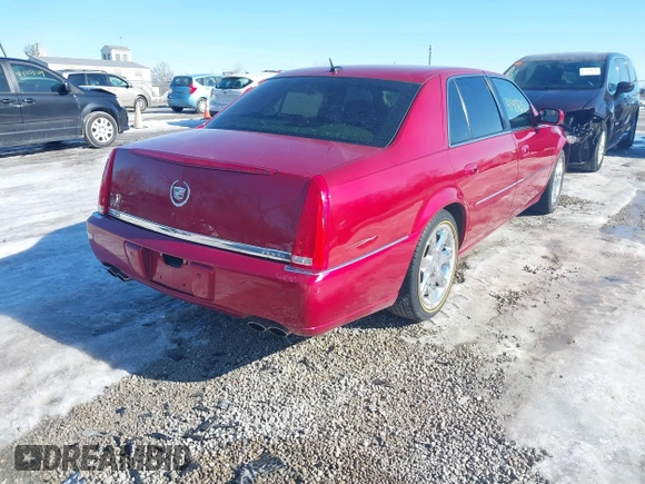 2006 Cadillac DTS w/1SC with VIN 1G6KD57Y06U210141, listed as a IAAI auction lot 41406256 with 184,569 mi miles. Bid and sale history available at carsss.com. Image 4.