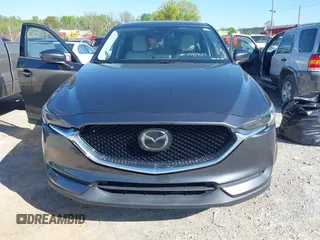 2018 Mazda CX-5 Grand Touring with VIN JM3KFBDM7J0454836, listed as a IAAI auction lot 42001397 with 146,879 mi miles. Bid and sale history available at carsss.com. Image 12.