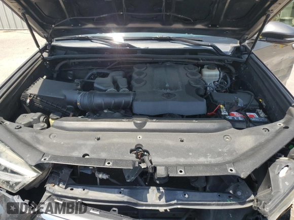 2014 Toyota 4Runner SR5 with VIN JTEZU5JR3E5075786, listed as a Copart auction lot 57126775 with 140,577 mi miles and Salvage title. Bid and sale history available at DreamBid. Image 12.