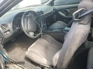 1995 Pontiac Firebird Firebird z VIN 2G2FS22S6S2237631, wystawiony jako Copart lot #61542625 z przebiegiem Nie podano mil oraz Szkoda całkowita • Salvage title. Historia ofert i sprzedaży dostępna na DreamBid. Obrazek 7.