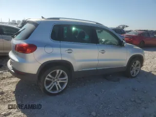 2012 Volkswagen Tiguan S with VIN WVGBV7AX5CW601352, listed as a Copart auction lot 48768155 with 161,632 mi miles and Salvage Title. Bid and sale history available at DreamBid. Image 3.