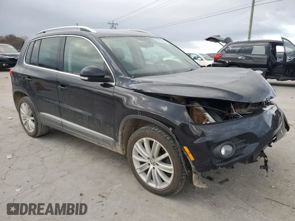 2012 Volkswagen Tiguan SE z VIN WVGAV7AXXCW531875, wystawiony jako Copart lot #82137824 z przebiegiem 147 210 mil mil oraz Tytuł czysty. Historia ofert i sprzedaży dostępna na DreamBid. Obrazek 4.