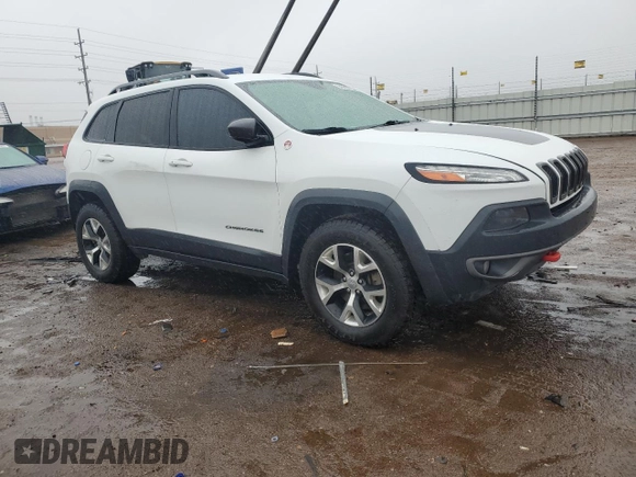 2017 Jeep Cherokee Trailhawk with VIN 1C4PJMBS1HW622388, listed as a Copart auction lot 54990075 with 101,437 mi miles and Salvage title. Bid and sale history available at DreamBid. Image 4.