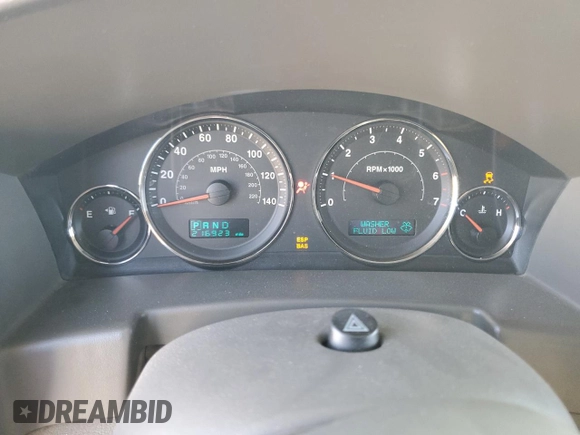 2006 Jeep Commander with VIN 1J8HH48K26C263986, listed as a Copart auction lot 84712294 with 216,923 mi miles and Salvage title. Bid and sale history available at DreamBid. Image 9.
