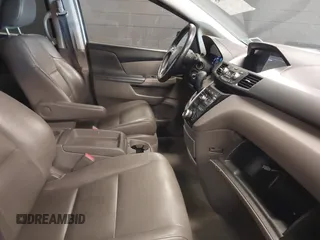 2013 Honda Odyssey EX-L with VIN 5FNRL5H66DB071151, listed as a IAAI auction lot 41914345 with 194,804 mi miles and . Bid and sale history available at carsss.com. Image 5.