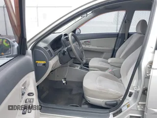 2009 Kia Spectra EX z VIN KNAFE221X95658662, wystawiony jako IAAI lot #42312854 z przebiegiem 100 489 mil mil oraz . Historia ofert i sprzedaży dostępna na DreamBid. Obrazek 5.