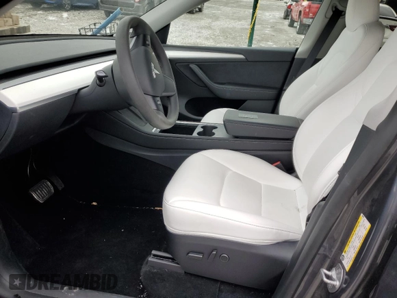 2023 Tesla Model Y Long Range z VIN 7SAYGDEE8PF884567, wystawiony jako Copart lot #45181465 z przebiegiem 16 653 mil mil oraz Szkoda całkowita • Salvage title. Historia ofert i sprzedaży dostępna na DreamBid. Obrazek 7.