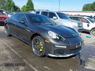 2014 Porsche Panamera S E-Hybrid with VIN WP0AD2A76EL044591, listed as a IAAI auction lot 42436817 with 89,009 mi miles and . Bid and sale history available at DreamBid. Image 1.