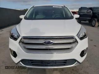2019 Ford Escape SE z VIN 1FMCU9GD9KUA02481, wystawiony jako Copart lot #57919925 z przebiegiem 63 874 mil mil oraz Czysty tytuł • Clean title. Historia ofert i sprzedaży dostępna na DreamBid. Obrazek 5.