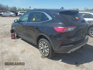 2021 Ford Escape Titanium with VIN 1FMCU9J95MUA77427, listed as a IAAI auction lot 42227275 with 75,079 mi miles and . Bid and sale history available at DreamBid. Image 3.