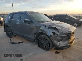 2022 Mazda CX-5 2.5 Turbo with VIN JM3KFBAY7N0647324, listed as a Copart auction lot 88488905 with 37,595 mi miles and Salvage Title. Bid and sale history available at carsss.com. Image 4.