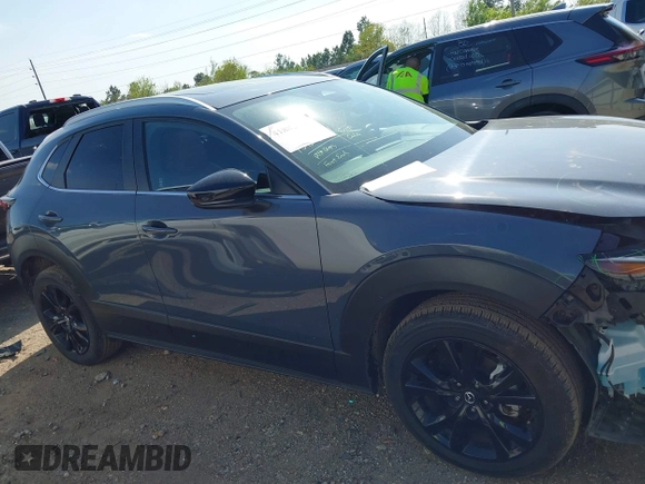 2024 Mazda CX-30 S Carbon Edition z VIN 3MVDMBCM6RM682780, wystawiony jako IAAI lot #41882767 z przebiegiem 19 047 mil mil oraz . Historia ofert i sprzedaży dostępna na DreamBid. Obrazek 14.