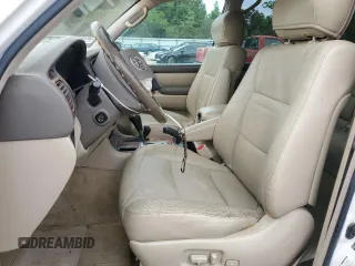 2006 Toyota Land Cruiser z VIN JTEHT05J162094541, wystawiony jako Copart lot #55260235 z przebiegiem 184 629 mil mil oraz Szkody całkowita. Historia ofert i sprzedaży dostępna na DreamBid. Obrazek 7.