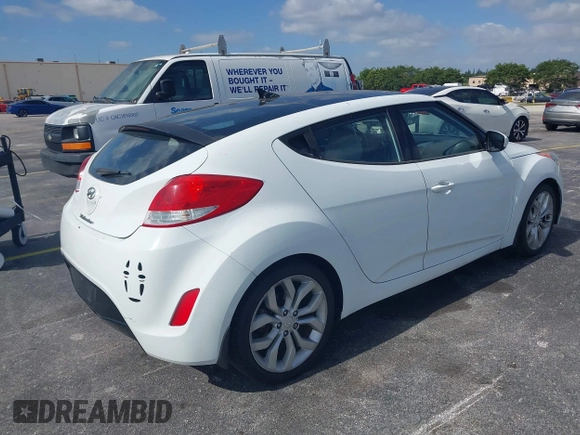 2013 Hyundai Veloster w/Gray Int with VIN KMHTC6AD0DU150516, listed as a IAAI auction lot 42164880 with 122,841 mi miles and . Bid and sale history available at DreamBid. Image 4.