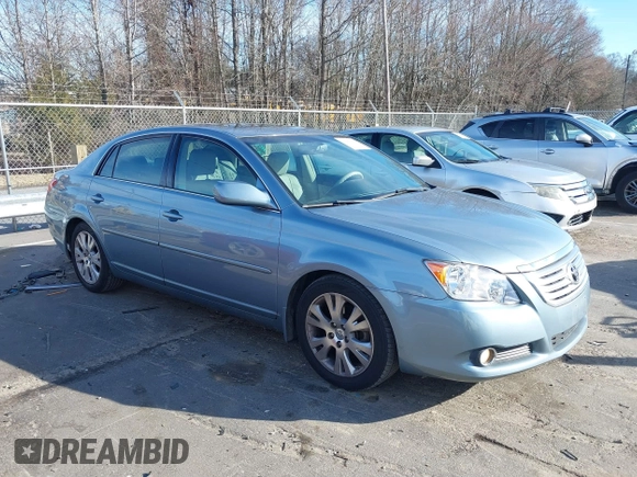 2009 Toyota Avalon XL with VIN 4T1BK36B19U350297, listed as a IAAI auction lot 41589714 with 141,003 mi miles. Bid and sale history available at carsss.com. Image 1.
