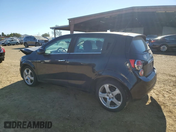 2012 Chevrolet Sonic LTZ z VIN 1G1JE6SH5C4195594, wystawiony jako Copart lot #88336435 z przebiegiem 105 112 mil mil oraz Szkoda całkowita • Salvage title. Historia ofert i sprzedaży dostępna na DreamBid. Obrazek 2.