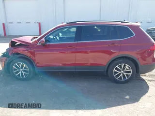 2019 Volkswagen Tiguan SE with VIN 3VV3B7AX3KM130075, listed as a IAAI auction lot 41807584 with 57,308 mi miles and . Bid and sale history available at DreamBid. Image 14.