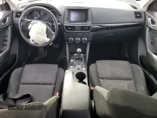 2016 Mazda CX-5 Sport with VIN JM3KE2BY0G0703866, listed as a Copart auction lot 43708185 with 186,790 mi miles and Salvage Title. Bid and sale history available at carsss.com. Image 8.