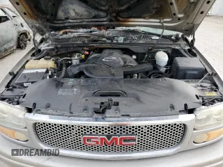 2005 GMC Sierra Denali z VIN 2GTEK63N651271425, wystawiony jako Copart lot #66397764 z przebiegiem Nie podano mil oraz Szkody całkowita. Historia ofert i sprzedaży dostępna na DreamBid. Obrazek 11.